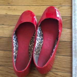 Red patent leather flats. Gently worn.